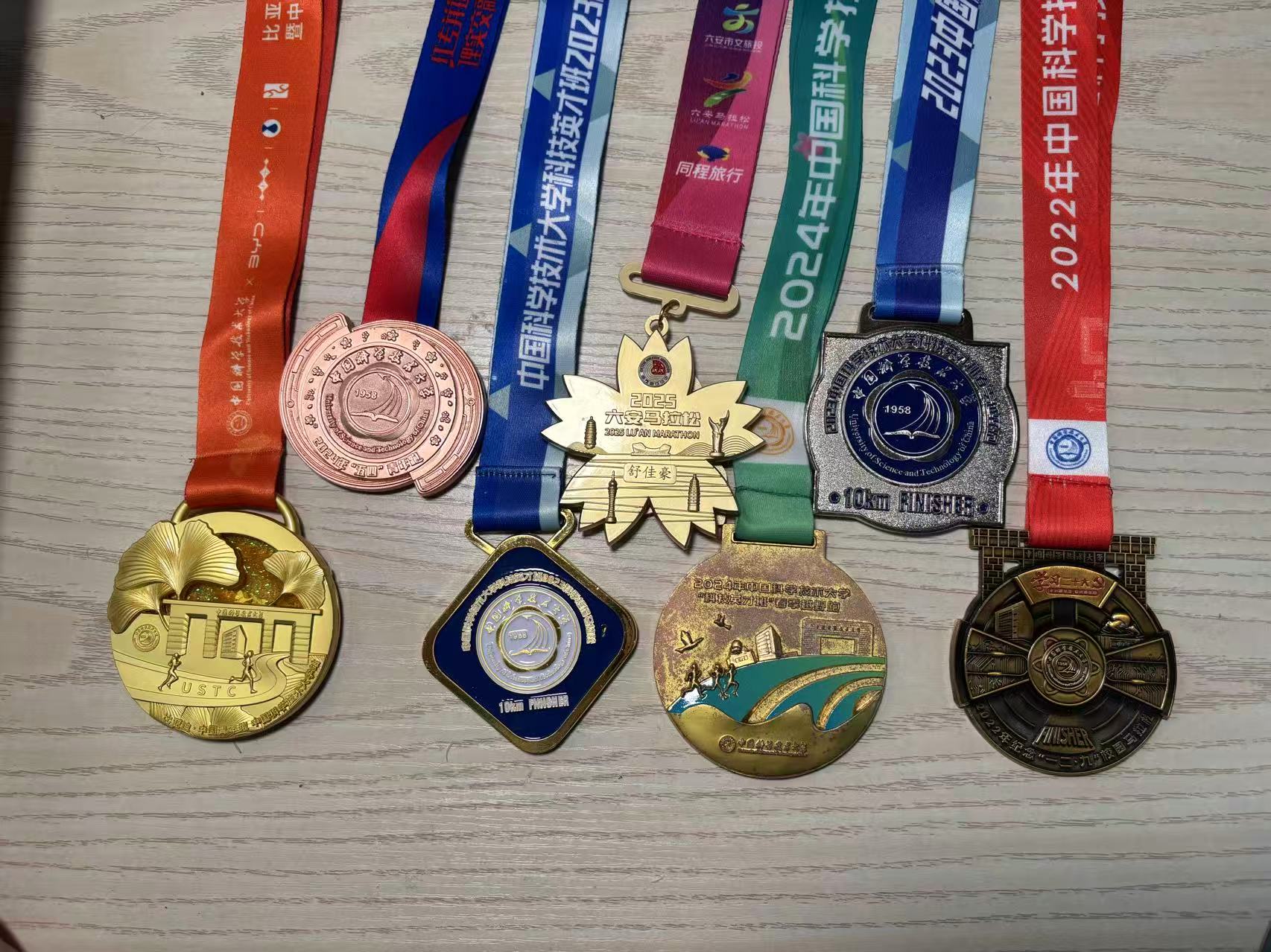 My running medals from 10K races and marathons
